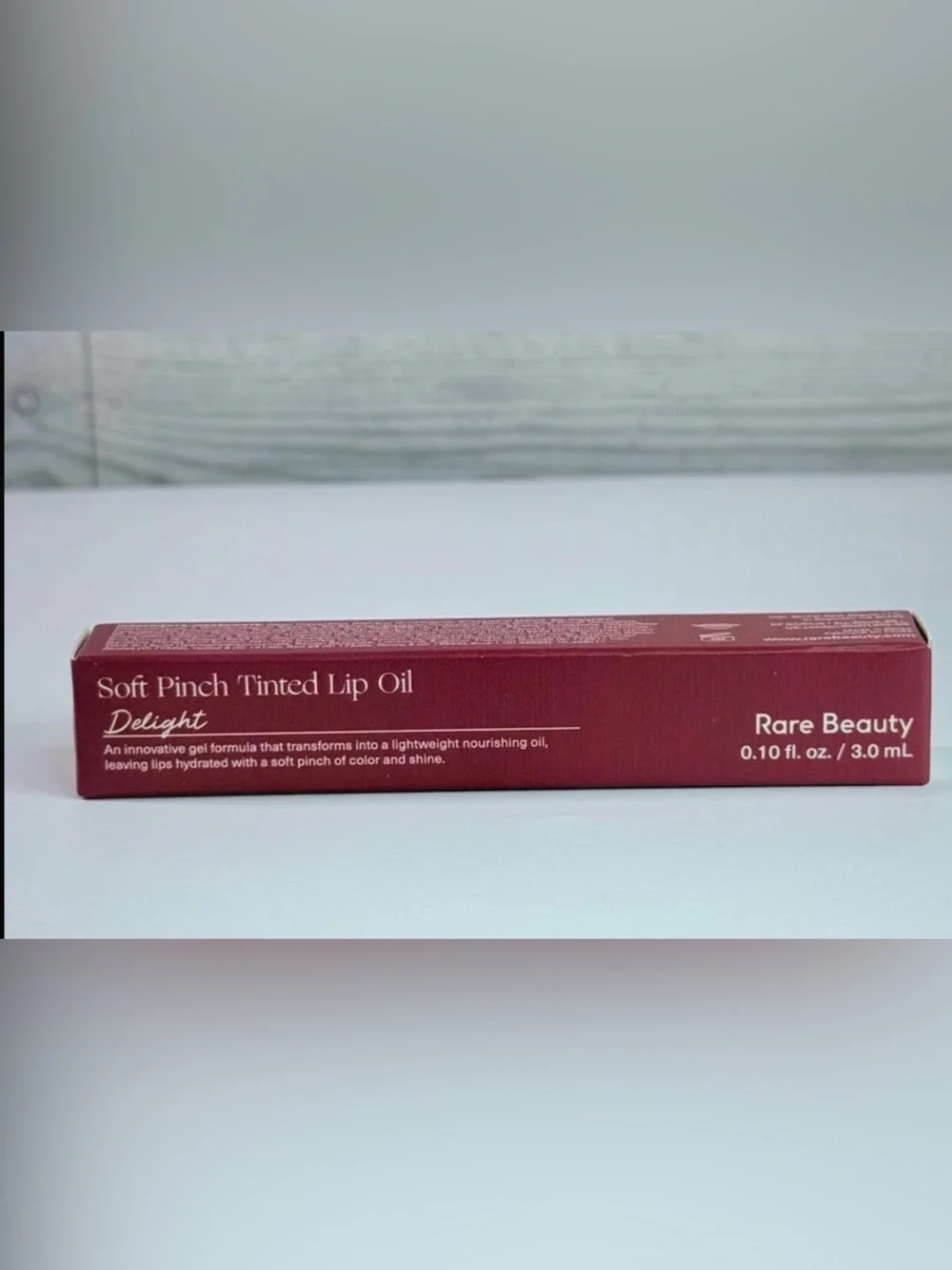 Rare beauty Tinted Lip Oil in shade Delight